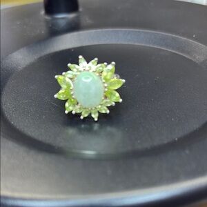 Green Floral Gemstone Ring with Sunburst Design